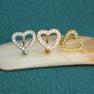 Set of heart-shaped belly rings in silver, gold, and rose gold with clear zircon stones