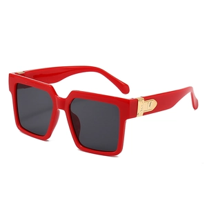 Red oversized square frame sunglasses with black lenses and gold M-metal temple accents