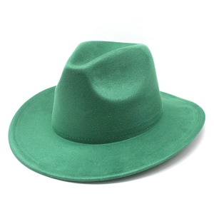 Detail of green suede fedora hat with reinforced brim stitching and classic crown