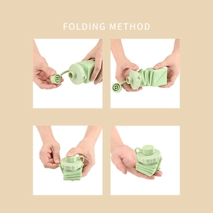 Collapsible square silicone water bottle in light green with four-step folding guide