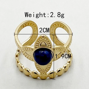 Detail of gold double-layer ring with blue stone, featuring dimensions and weight info