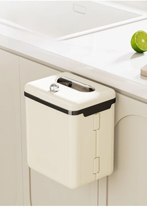 Close-up of wall-mounted cream seasoning storage box with silver handle and transparent lid