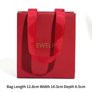 Red jewelry gift bag with gold logo and satin ribbon handles, size 12.8x14.3x6.5cm