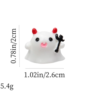 Detailed view of tiny white cartoon ghost figurine with red horns and trident measurements
