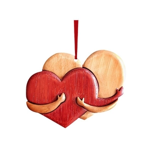 Interlocking double heart wooden ornament with red accents and natural grain textures