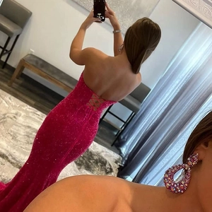 Sparkly rose red sequin mermaid evening gown with v-neck and lace-up back design