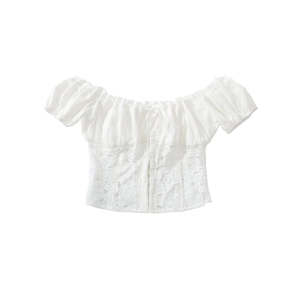 Detail of white off-shoulder lace patchwork top with puff sleeves and ribbon ties