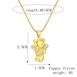 Detailed size specifications for a gold bear pendant necklace with pave zircon stones
