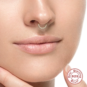 925 sterling silver gold septum ring with sparkling stones shown on model