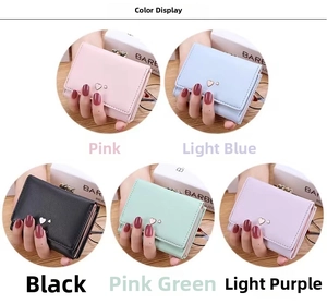 Detail showing five color variations of the minimalist trifold heart wallet for women