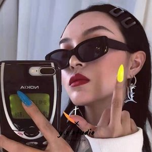 Trendy black cat eye sunglasses for women with vintage gothic punk aesthetic style