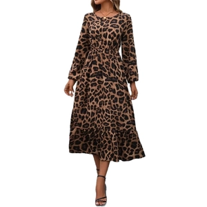 Detail of elegant leopard print midi dress with lantern sleeves and ruffled hem design