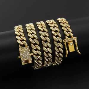 Detailed close-up of 8mm gold plated Cuban chain necklace with sparkling rhinestones