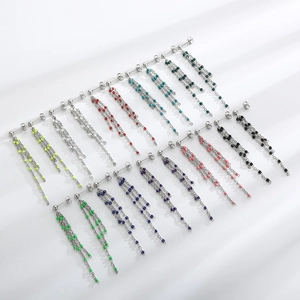Detail view of colorful resin bead tassels and stainless steel threader earrings set