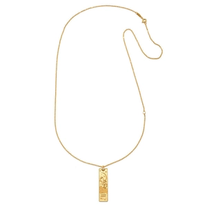 Detail of 18K gold plated tarot pendant with embossed celestial figures on ball chain
