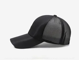 Side view of black mesh baseball cap with Sport embroidery and breathable fabric
