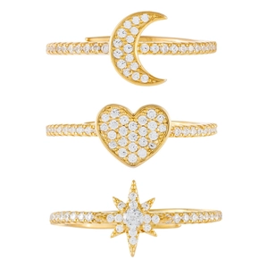 Set of three gold plated rings featuring crescent moon, heart and star zircon charms