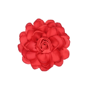 Macro shot of large red satin rose fabric flower with multi-layered delicate petals
