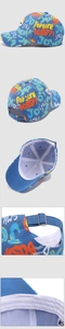 Detail view of cotton baseball cap showing graffiti print and adjustable metal buckle