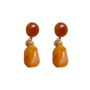 Vintage irregular geometric resin earrings with amber tones and gold knot details