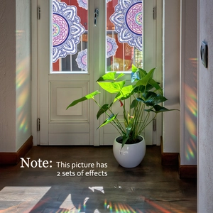 Mandala glass window film creates rainbow prismatic effects on white frame glass doors