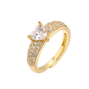 Adjustable gold ring featuring a heart-shaped zircon stone with pavé setting