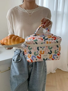 Sac de rangement matelassé en coton avec motifs géométriques colorés et poignée