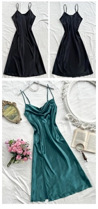 Detail of satin slip dress showing delicate adjustable straps and cowl neck design