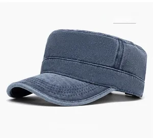 Detailed close-up of navy blue cadet cap showing reinforced stitching on washed cotton fabric