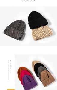 Close-up of thick ribbed knit texture on multi-color winter fisherman beanies