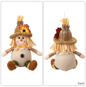 Detailed front and back views of Thanksgiving straw doll with sunflowers and maple leaves