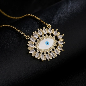 Luxurious 18K gold plated copper evil eye necklace with sparkling cubic zirconia stones