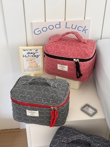 Quilted heart grid cosmetic bags in red and black with top handle and dual zippers