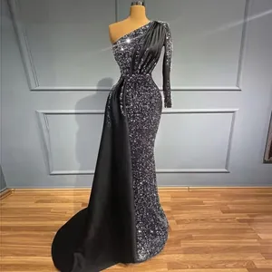 Elegant one-shoulder sequin evening gown with fishtail hem and black satin side train