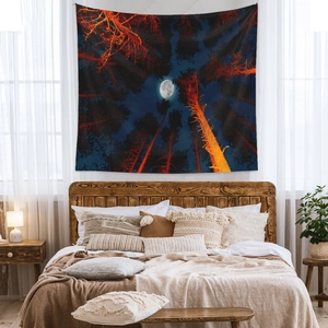 Bohemian forest tapestry featuring full moon and starry night sky above trees for bedroom decor