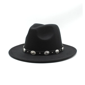 Detail of vintage black fedora hat featuring bohemian silver concho metal band decor