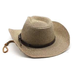 Detail of western straw hat showing woven texture and brown leather decorative band