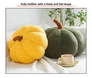 Close-up of fluffy velvet pumpkin pillows in yellow and green on a cozy home sofa