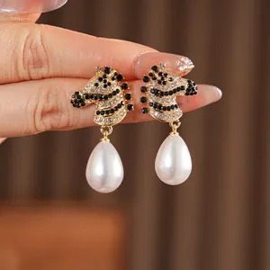 Vintage zebra drop earrings with sparkling rhinestones and elegant white pearl pendants