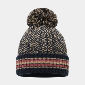 Bonnet en tricot pour femme avec motifs jacquard bleu marine et un grand pompon doux
