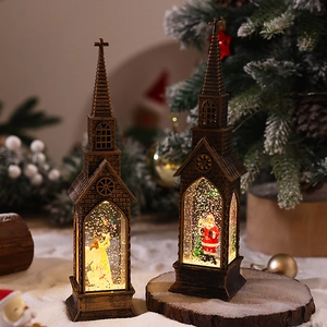 Macro detail of retro bronze church lanterns with glowing LED Santa and Angel figures