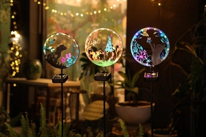 Solar yard lights featuring dog, gnome, and cat silhouettes with colorful LED glow