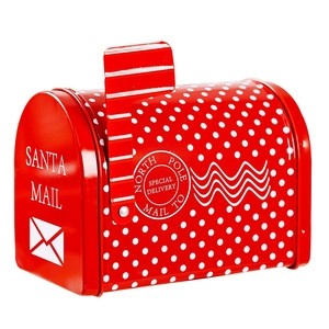 Detail of red polka dot Christmas metal mailbox featuring Santa Mail engraving and flag