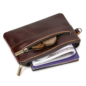 Detailed view of dark brown crazy horse leather wallet with multi-zipper compartments