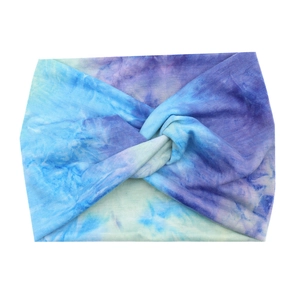 Bohemian wide knotted headband with blue and purple tie-dye print for sports and styling