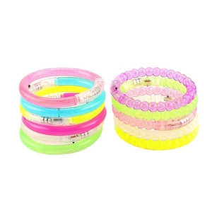 Colorful LED glowing acrylic bubble bracelets in smooth and beaded stackable designs