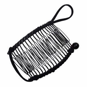 Classic black metal banana hair clip and styling comb tool on a clean white background