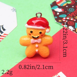 Detailed macro view of gingerbread man resin charm with dimensions and weight metrics