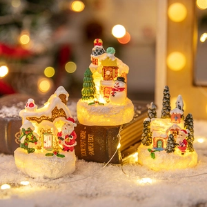 Three-piece glowing resin Christmas miniature set with Santa, snowman and cabin