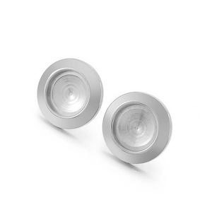 Polished silver round metal stud earrings with brushed texture surface on white background